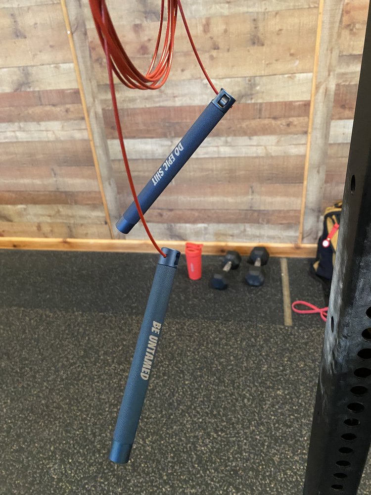 Jump rope that says Do Epic Shit and Be Untamed on the Handles